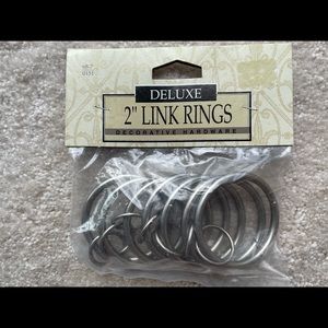 Silver curtain rings. 2”